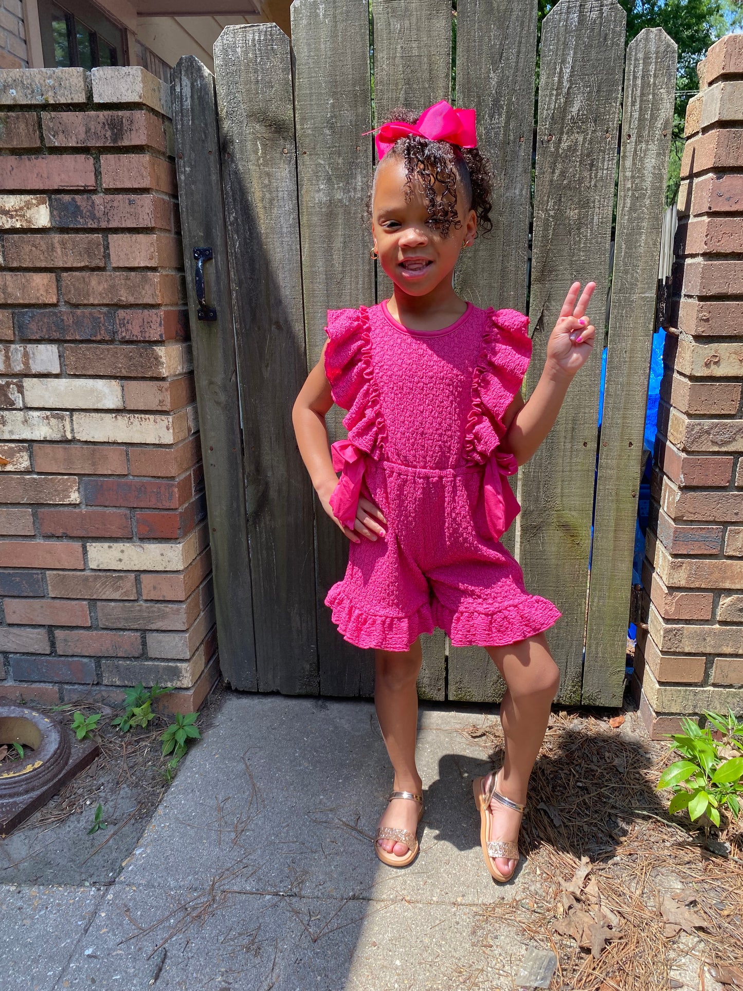 Fuchsia Ruffle Romper