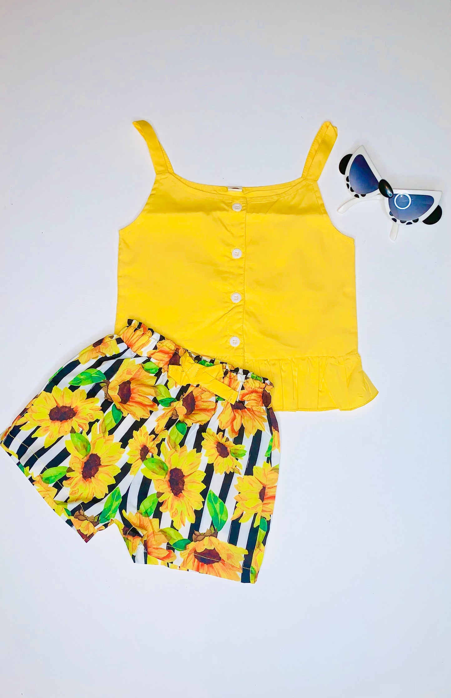 Yellow Sleeveless Top and Floral Striped Shorts