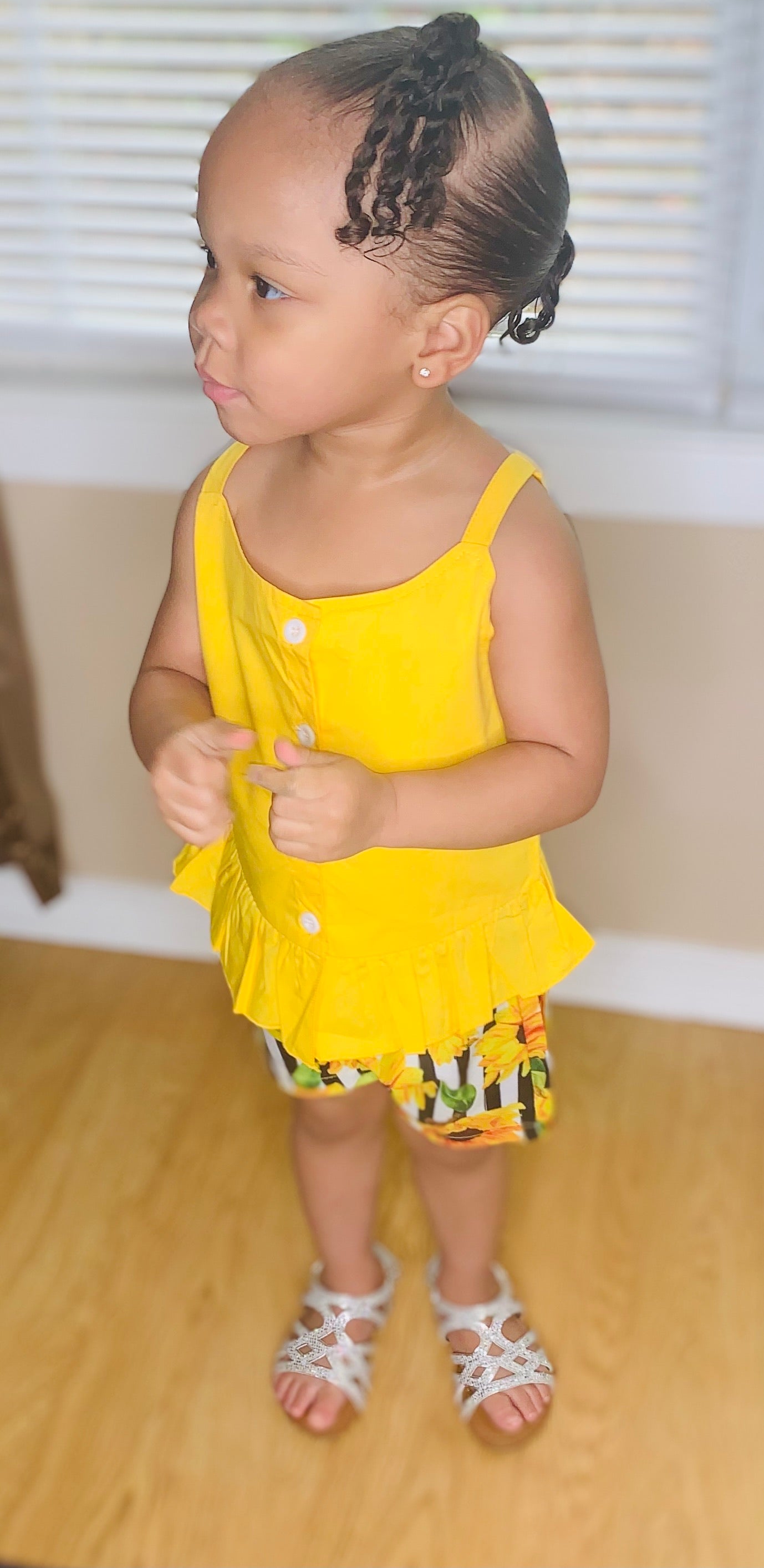Yellow Sleeveless Top and Floral Striped Shorts