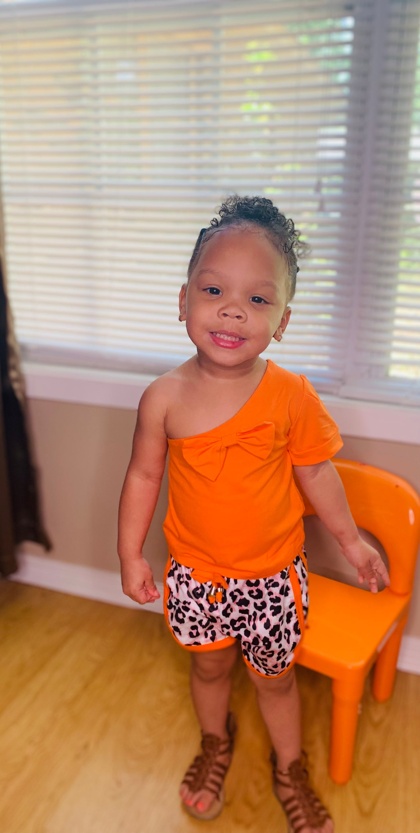 Orange One Shoulder Top and Leopard Shorts