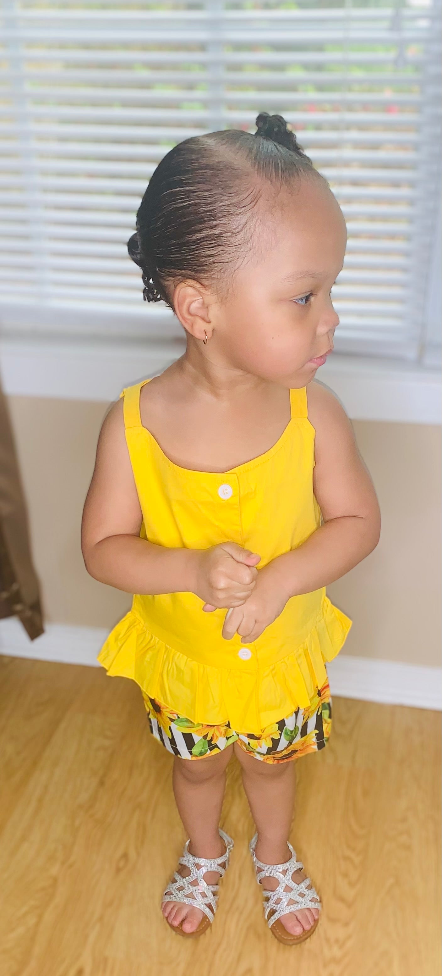 Yellow Sleeveless Top and Floral Striped Shorts